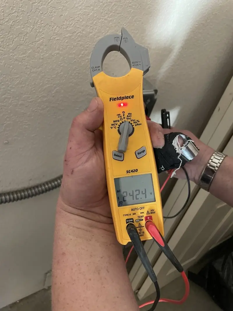 Voltage testing with clamp meter during Aluminum Wiring Replacement in Pleasantville